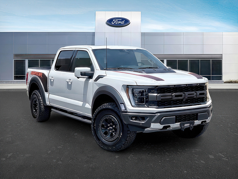 The same Ford pickup presented in front of a branded dealership.