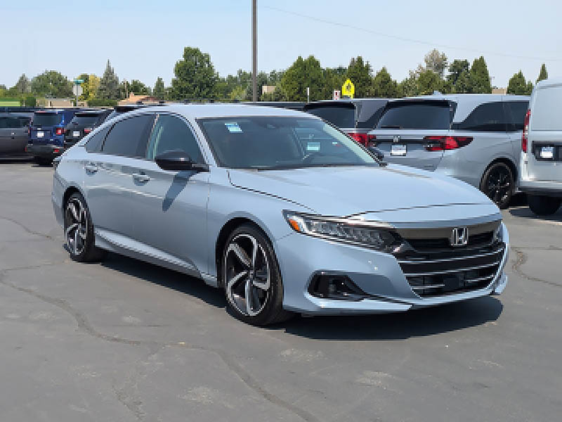 Original silver Honda sedan photographed outdoors.